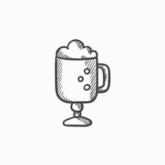 Glass mug with foam sketch icon.