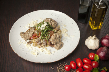 Veal medallions portion