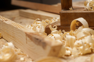 carpenter working,hammer,meter and screw-driver on construction