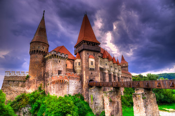 Fototapeta na wymiar Hunyad Corvin castle iwith storm clouds in Hunedoara,Transylvania,Romania,Europe