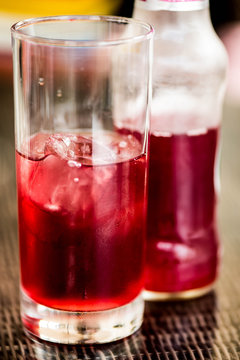 Bottle and Glass of Apple and Blackberry Juice Soft Drink