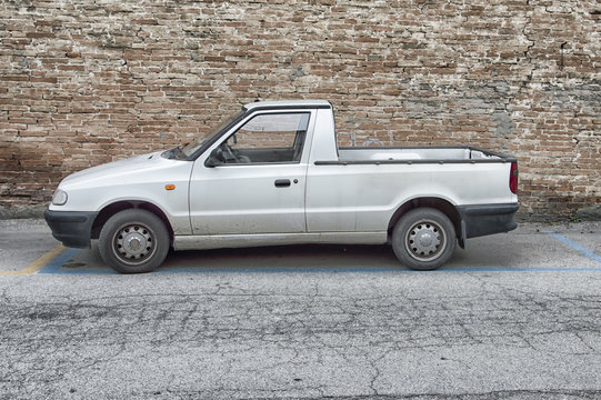 Small White Van Parked On The Street