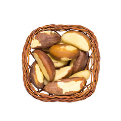 Top view of Brazil Nuts in pretty little basket. This seed is a great source of selenium and a natural antioxidant