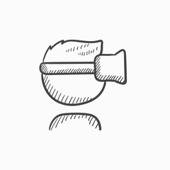 Man wearing virtual reality headset sketch icon.