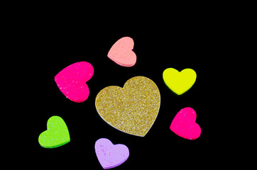 Fototapeta premium Heart of gold many colors Black background