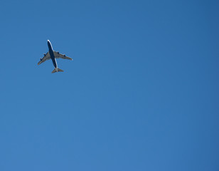 Passenger jet clear blue sky