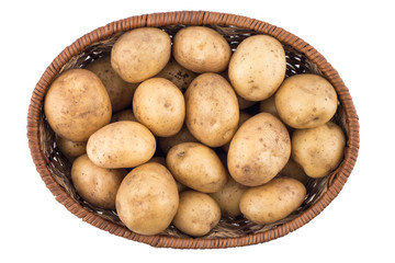 Raw potatoes in basket on white background.