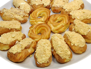 many eclairs cakes closeup