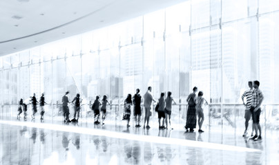 group of people in the lobby business center and blue tonality