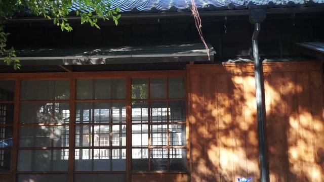 Traditional classic Japanese style architecture. Wooden house with glass