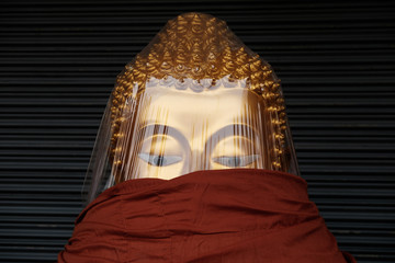 Buddha take in the fabric mask