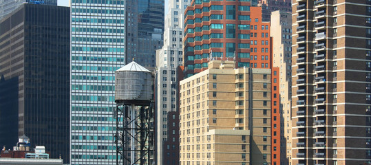 New York - Buildings in Manhattan with water tank roof
