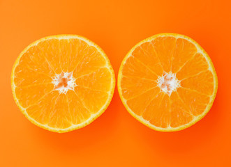 Slices Orange on orange color background.