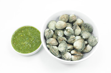 roughly cockle with seafood dipping sauce flavoursome on white background