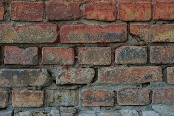 Old red painted brick wall