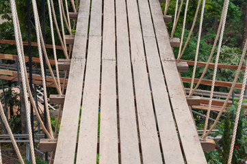 Fototapeta premium Suspension bridge, walkway to the adventurous, cross to the other side forest