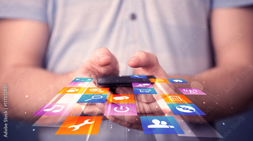 Poster Man holding smart phone with colorful application icons