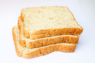 Wholewheat breads on white background.