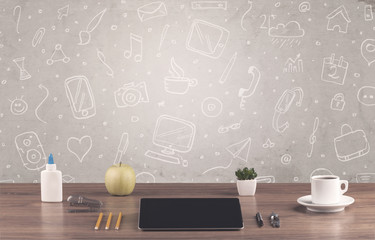 Design office desk with drawings background