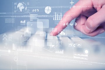 Keyboard buttons pressed by hand with high tech icons