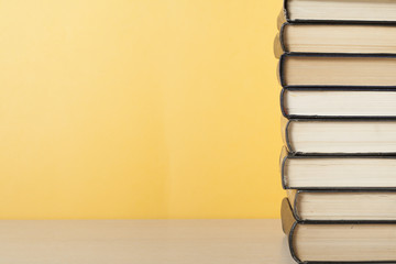 Stack of colorful books. Education background. Back to school. Copy space for text.