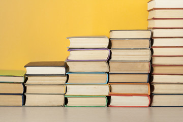 Stack of colorful books. Education background. Back to school. Copy space for text.