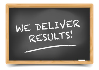 Obraz premium Blackboard We Deliver Results