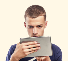 Young man using tablet pc