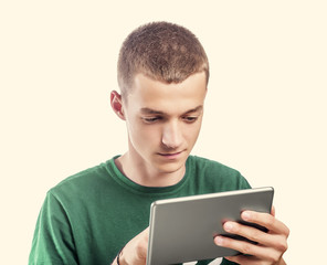 Young man using tablet pc