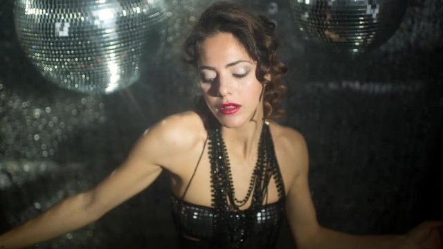 beautiful sexy disco dancing girl in club setting
