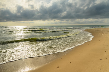 Beautiful tropical beach under gloomy sky