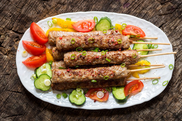 Minced meat kebab with fresh vegetable
