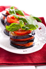 Roasted aubergine and  tomato stack
