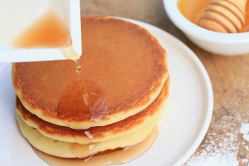 tasty pancake with honey
