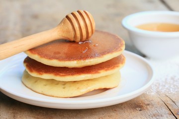 tasty pancake with honey