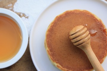 tasty pancake with honey