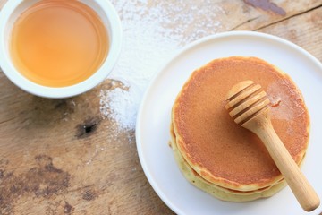 Obraz na płótnie Canvas tasty pancake with honey