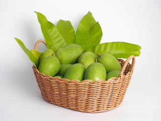 green mango in basket
