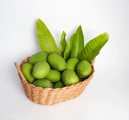 green mango in basket