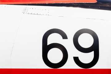 Painted number on an old war plane