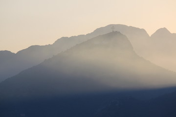 Beautiful blue mountains in the fog. Coast of Salerno, Italy.