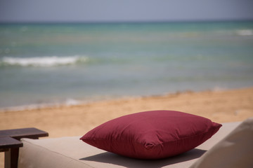Pillow at the beach with ocean