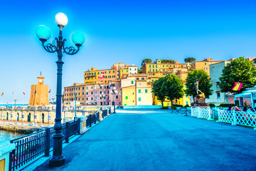 Beautiful and touristic area in the main square of Rio Marina town of Elba island, in Italy  - obrazy, fototapety, plakaty