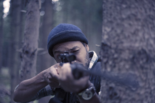 Interracial hunter in the forest