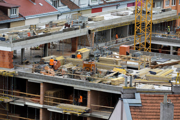 The workers at the construction site.