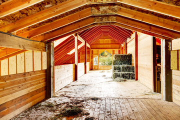 Hay under covered roof at the farm barn in Washington State, US