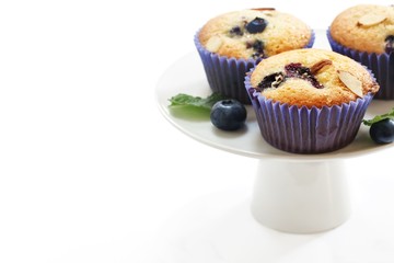 Homemade Blueberry muffins isolated on white, selective focus
