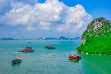 Fototapeta na wymiar Cruise boats in Halong Bay, Vietnam