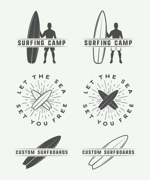 Set of vintage retro surfing, summer and travel logos, emblems