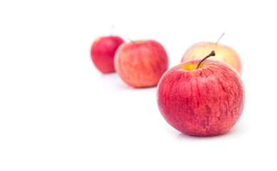 Red apples on white background
